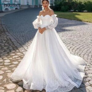 07edf0b3-ee49-41a4-864d-eac0585c9165.jpg Off-shoulder Lightweight Wedding Dress That Flatters The With A Trailing Train
