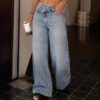 1f8a0cbd-a6f9-4ed3-9445-b0a2e524e707.jpg Retro Washed Distressed Asymmetrical Jeans