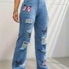 245c3dc8-e44a-4bf3-aeed-e39e8aec83c6.jpg High Waisted Straight Leg Jeans For Women Trendy Butterfly Print Ripped Distressed Denim Pants
