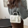 2fb65fb2-bb1a-4017-a2e3-0273cd14519a.jpg This Years Fashion Trend Textured Patchwork Tote Bags