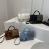 3ab1387b-48e7-4ac8-98eb-92c369a8ce10.jpg This Years Fashion Trend Textured Patchwork Tote Bags