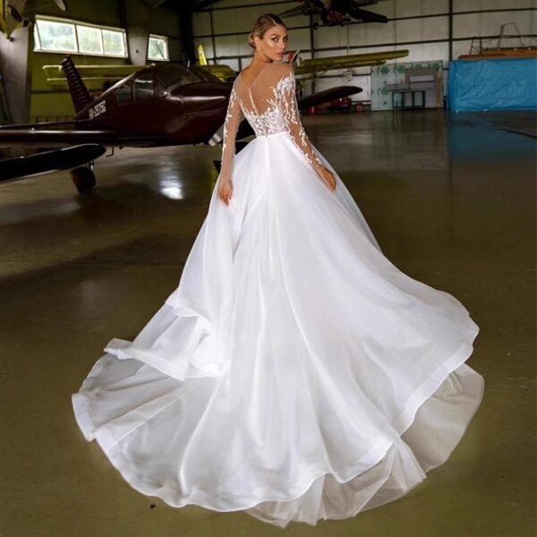 41abc206-8f8d-424a-819e-d6cf12cfa999.jpg Embroidered Long Sleeve Off-the-shoulder Wedding Dress