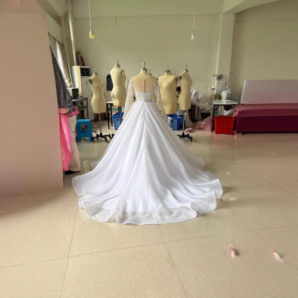 56646800-556b-47ee-817d-c386350baa2c.jpg Embroidered Long Sleeve Off-the-shoulder Wedding Dress