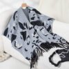 7effd72a-7432-4e88-aebb-e82e86715067.jpg Drizzle-Color Leopard-Print Knitted Tassel CapeShoulder Wrap For Women