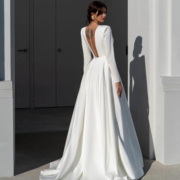 922b11dd-acc7-427b-b723-ebc26f3866d2_water.jpeg Simple Deep-V Long-sleeve Satin Bridal Gown Elegant Cathedral Train Luxurious Quality