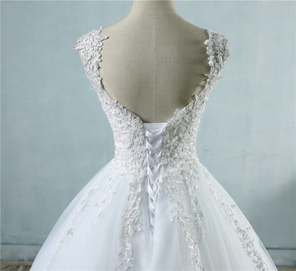 9d7475a6-5e9b-4d60-bd5e-cf090d8cdc72.jpg High Waist Wedding Dress With Deep V-neck