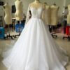 9f1447de-e349-4da7-a25e-55bc489948cb.jpg Embroidered Long Sleeve Off-the-shoulder Wedding Dress