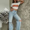 a4db333a-3c1e-49a6-bb38-d7b49f1e5f10.jpg American-style Distressed Design-forward Jeans