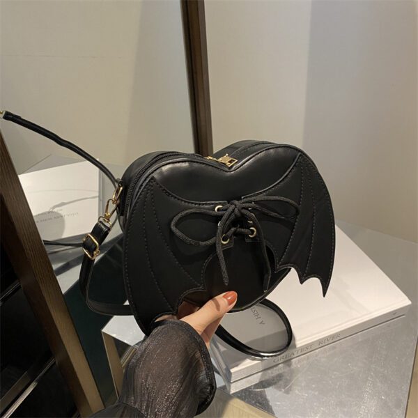ad33e59e-cf5d-4a5f-96d0-01743e8170fc.jpg Heart Shape Bag Strap Design Bat Wings One Shoulder Crossbody Bag