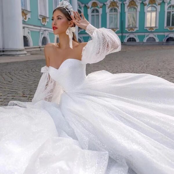 Off-shoulder Lightweight Wedding Dress That Flatters The  With A Trailing Train