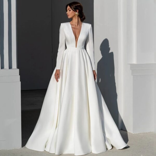 af903be6-f532-45d4-a681-fdeb76a379dd.jpg Simple Deep-V Long-sleeve Satin Bridal Gown Elegant Cathedral Train Luxurious Quality
