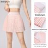 A Pleated Skirt Paired With A Pair Of Pleated Yoga Shorts