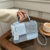 e0845571-10a9-4eed-9f6b-8a811c1a6cc2.jpg This Years Fashion Trend Textured Patchwork Tote Bags