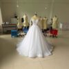 f1b18f8a-3f31-4ce7-9a57-ce650c87a842.jpg Embroidered Long Sleeve Off-the-shoulder Wedding Dress