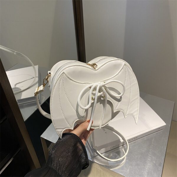 f793d5ed-456d-4f87-a55d-46694ae0f9ec.jpg Heart Shape Bag Strap Design Bat Wings One Shoulder Crossbody Bag